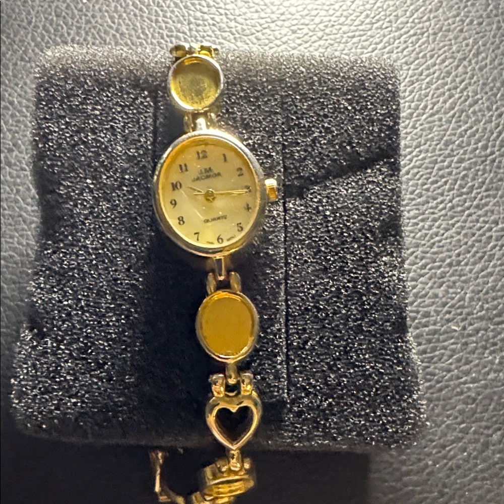 Elegant Gold Women's Watch with Heart Details